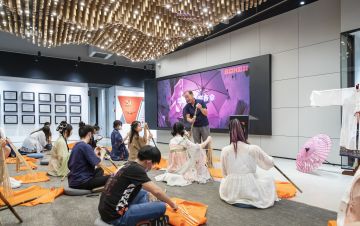 爆炒江湖X非遗文化：油布伞技艺绽放于游戏